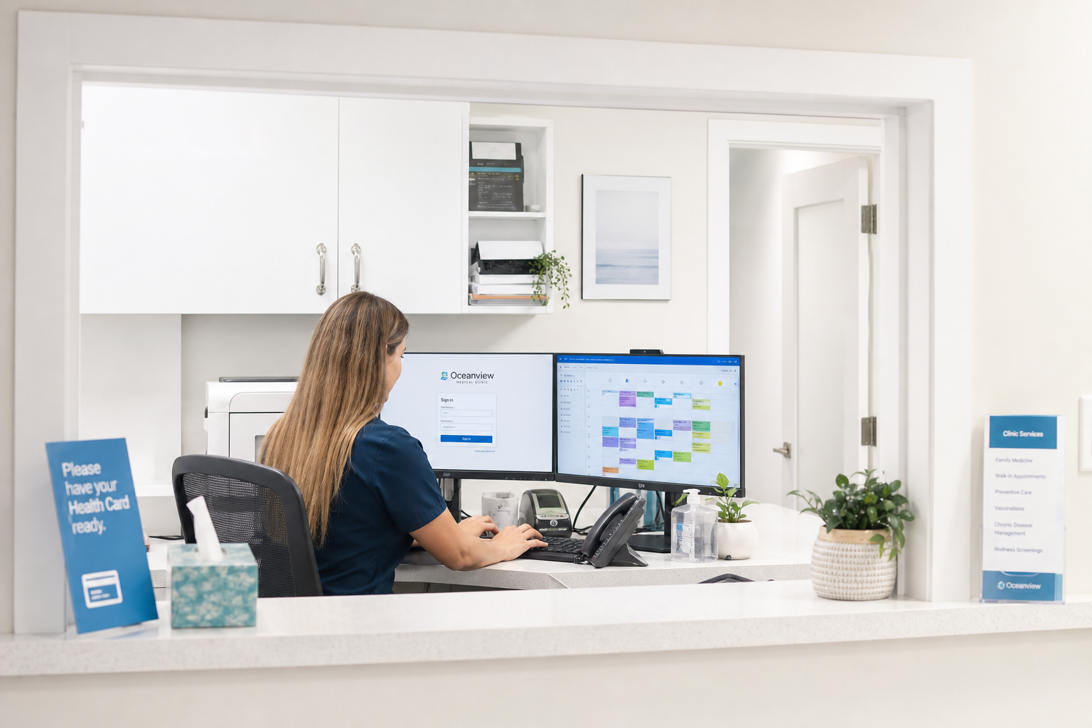 Through the serving hatch into the clinic's back office, the receptionist enters a patient's OHIP number into the booking