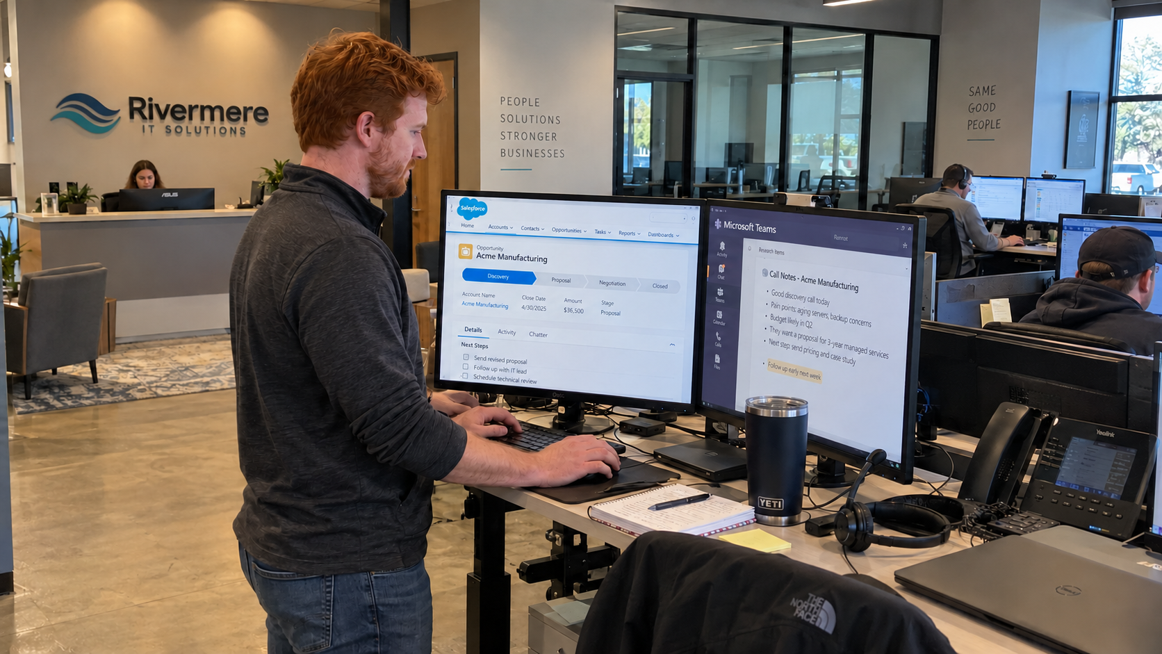 MSP salesperson updates CRM notes and sales pipeline stages at a standing workstation