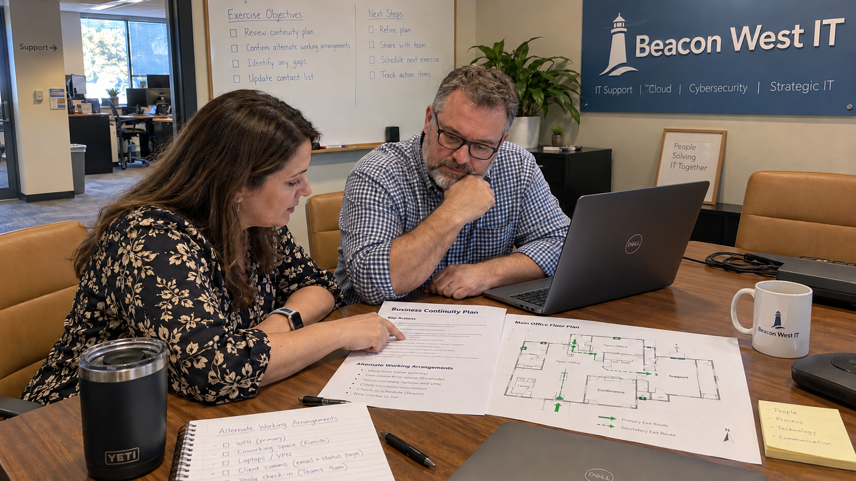 MSP vCIO and client operations manager review a business continuity plan template and an office floor plan.